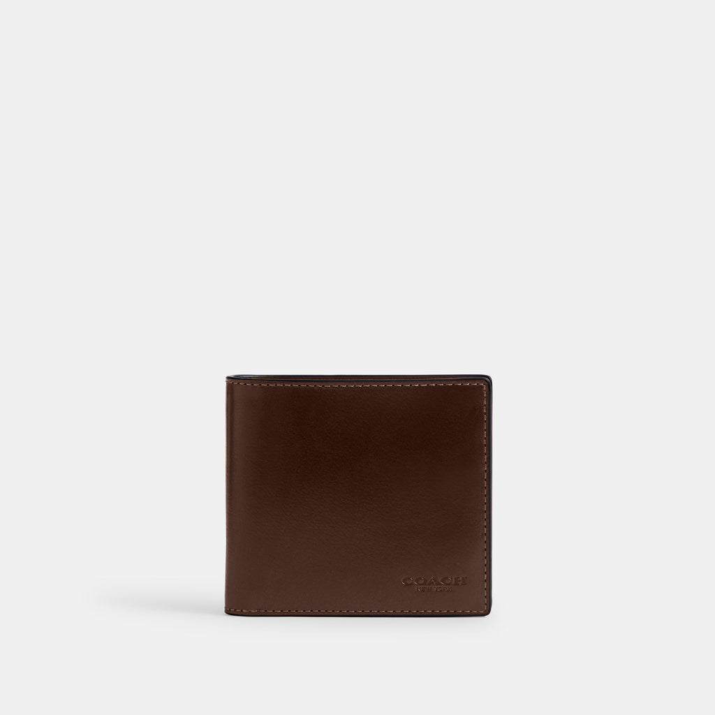 Cartera Coach en Piel