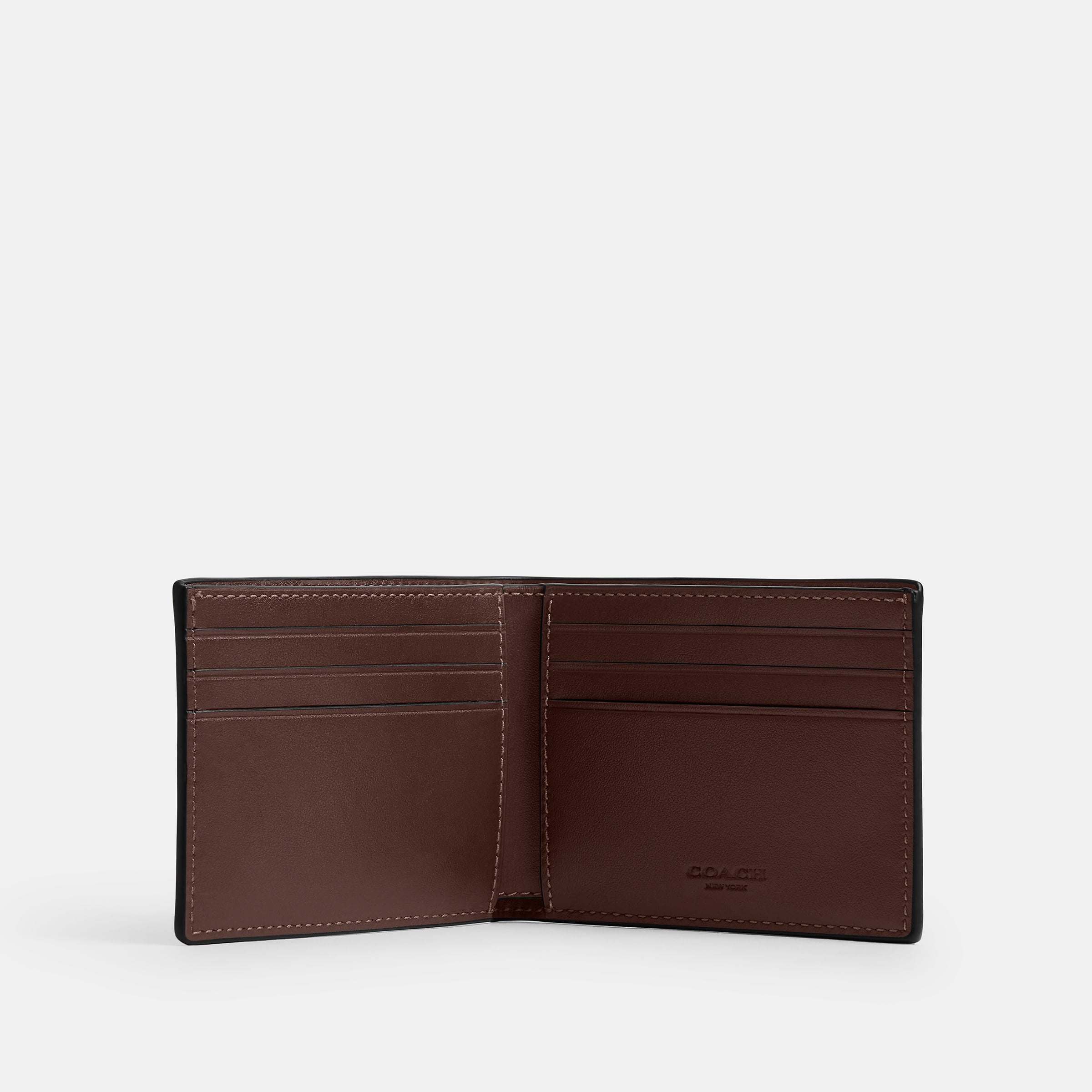 Cartera Delgada Coach en Signature