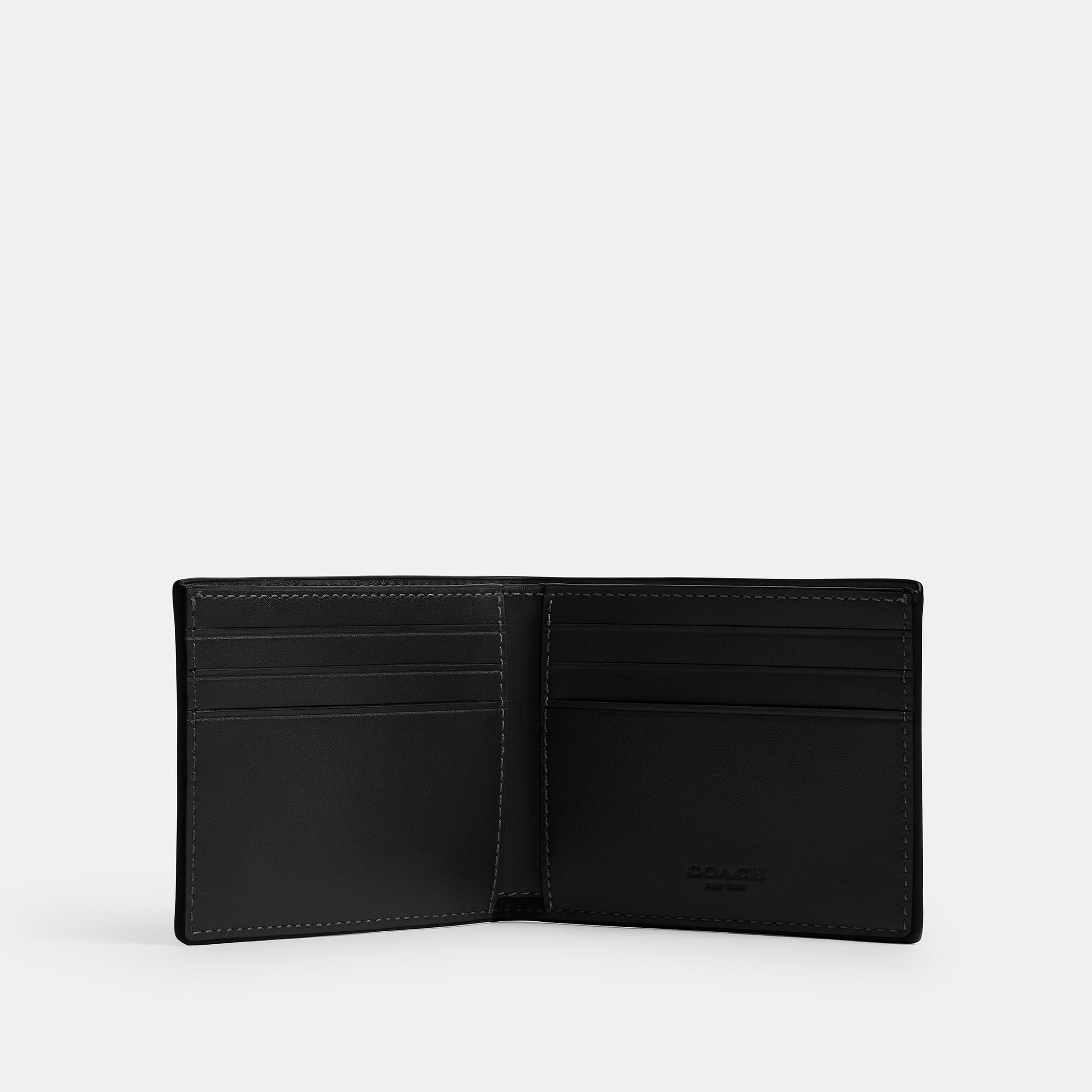 Cartera Delgada Coach en Signature