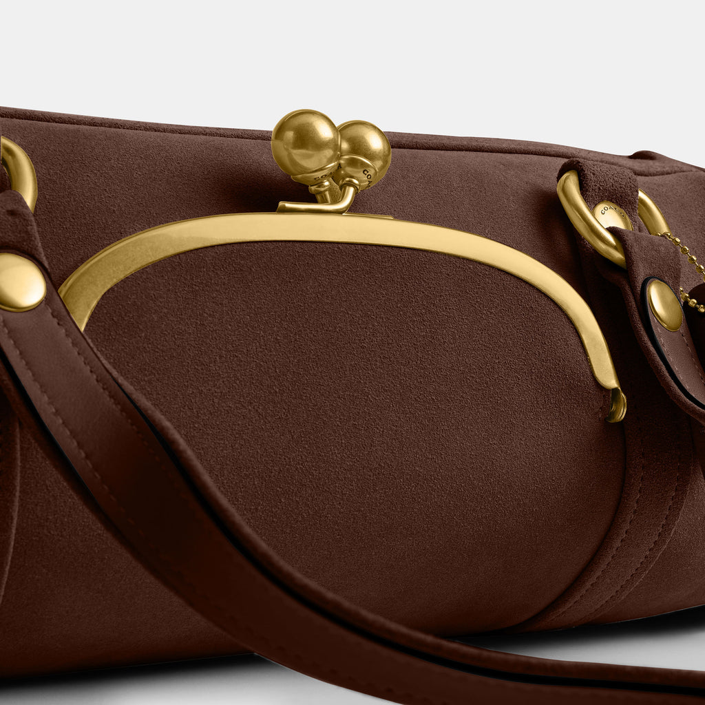 Bolsa Shoulder Coach Kisslock Barrel Suede