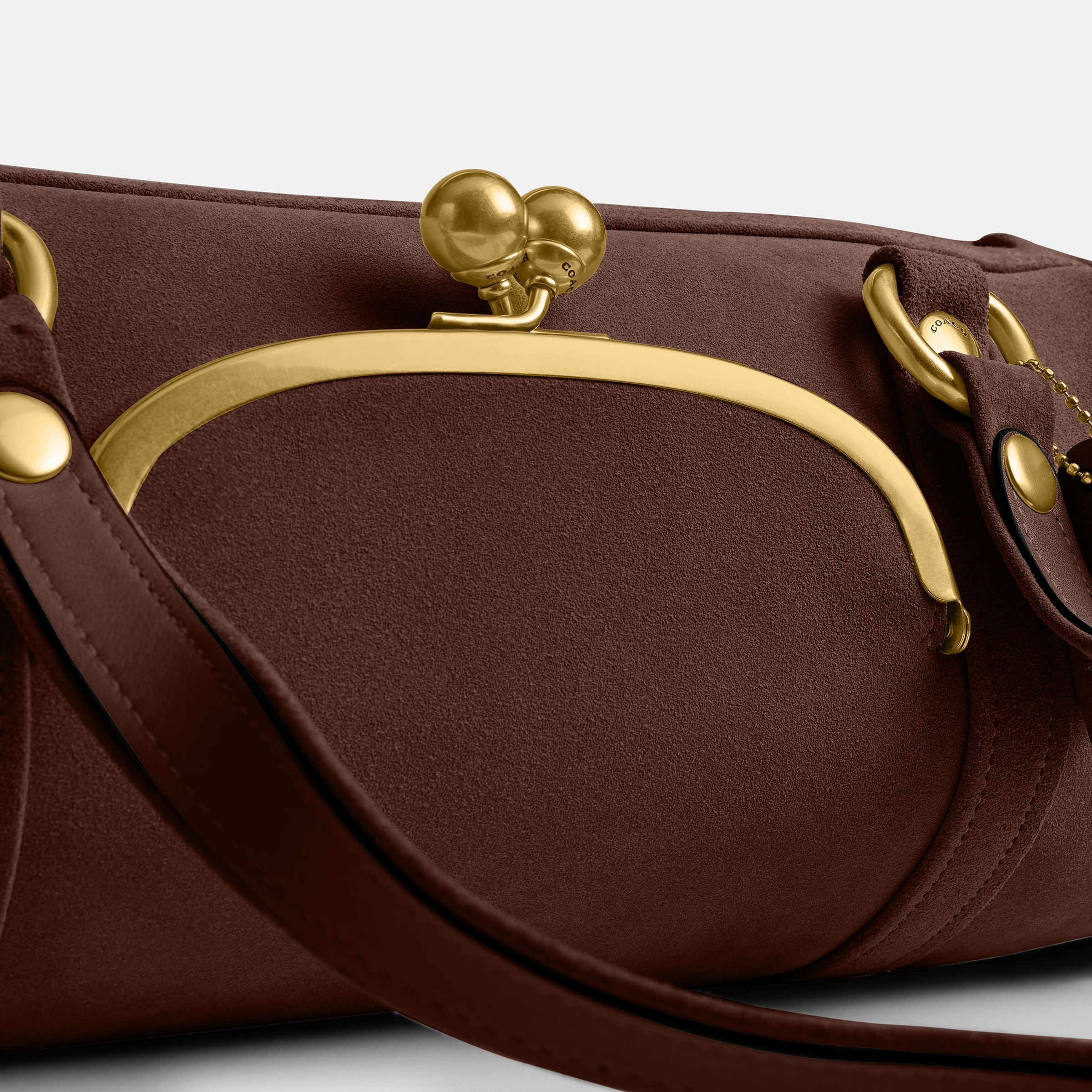 Bolsa Shoulder Coach Kisslock Barrel Suede