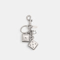 Bag Charm Coach Dados de Metal